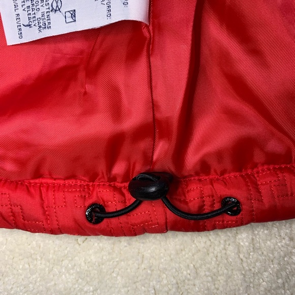 Tommy Hilfiger red puffer vest. Label shows Large, but fits like a Medium. - Picture 5 of 7